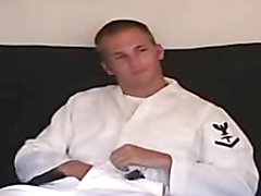 Sailor plays with his cock