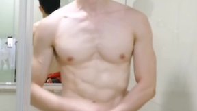 Chinese gay sporty superman sucks penis in toilet