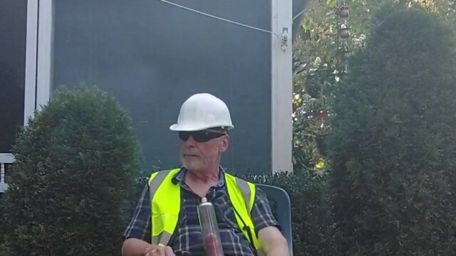 Construction dad finishes a long, hot day of work