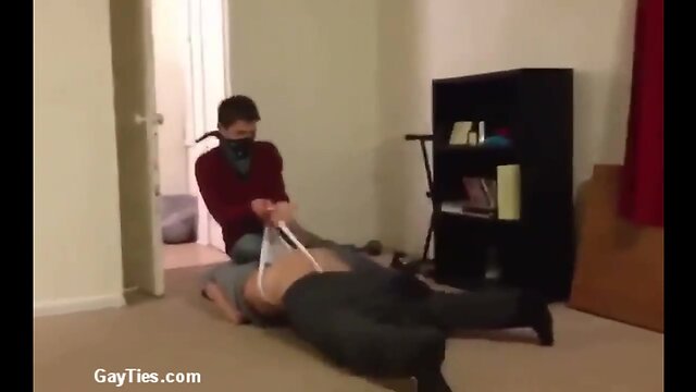 Nude guys goofing off in public